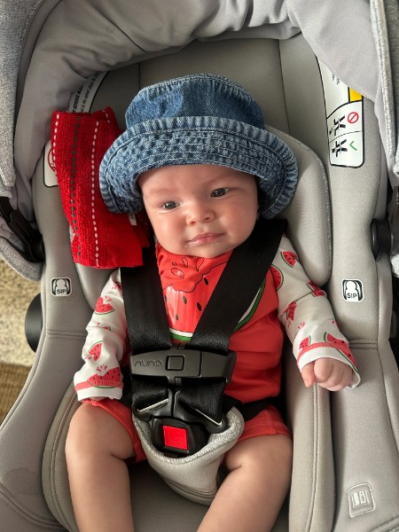 Coral in her denim hat