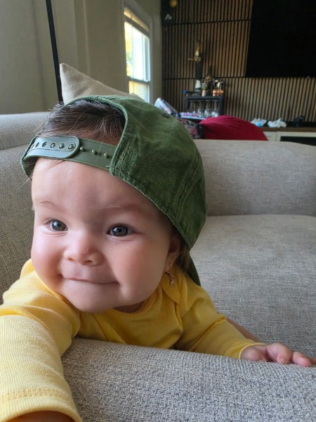 Coral in a green cap