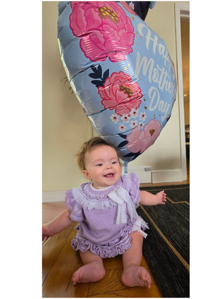 Coral with a Mother's Day balloon